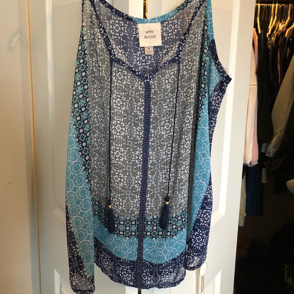 Sheer blouse with tie up fringe